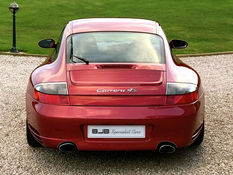 View PORSCHE 911 *SOLD* 996 CARRERA 4S COUPE. ORIENT RED METALLIC, BLACK LEATHER. RARE COLOUR, STUNNING.