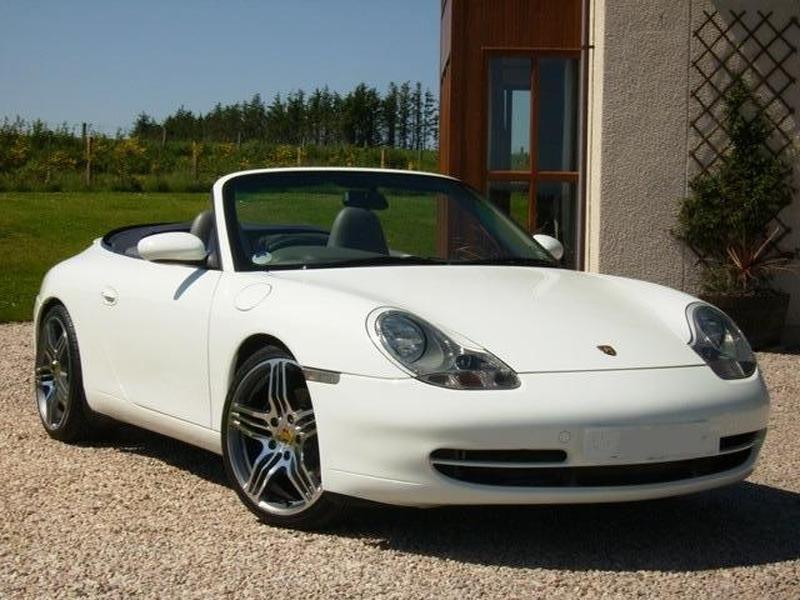 View PORSCHE 911 996 Carrera 2 Cabriolet 3.4 6 Spd Manual. Factory Grand Prix White Paintwork with Graphite Leather.